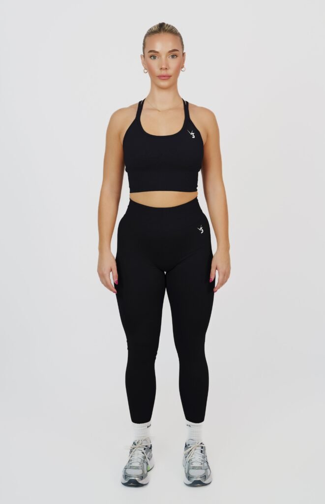 Black Sports Bra and Leggings Set shown in the selected color or assortment